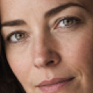 Unretouched 320-pixel crop from the cubic resize showing soft facial detail