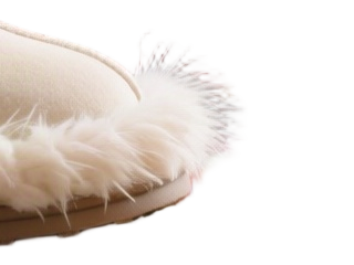 Fur trim at the toe of the slipper after background removal, on white, at 100%